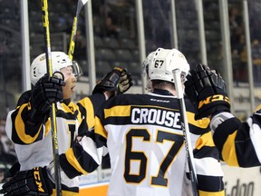 Kingston Frontenac's Jason Robertson celebrates after scoring his team's second goal of the game during Ontario Hockey League action against the Sarina Sting at the Rogers K-Rock Centre Centre in Kingston, Ont. on Sunday November 29, 2015. The Frontenacs defeated the Sting 4-1. Steph Crosier/Kingston Whig-Standard/Postmedia Network