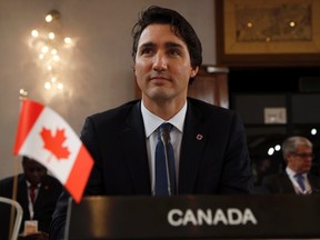 Canada's Prime Minister Justin Trudeau looks on at the start of the Climate Action Special Executive Session at the Commonwealth Heads of Government Meeting (CHOGM) in Valletta, Malta, November 27, 2015.  REUTERS/Darrin Zammit Lupi