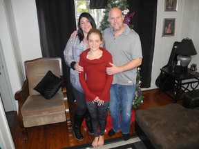 Wayne Lowrie/Postmedia Network
Parents Amy and Cam Jopp with Dallas in their Lansdowne home on the day after Dallas's emergency.