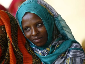 Eritrean refugees are seen at a temporary camp in Kassala, in eastern Sudan, on Oct. 22. Eritrea regularly features at the bottom of world lists for political and media freedoms, freedom of expression and human rights. Eritreans make up the third-largest number of refugees trying to reach Europe, after Syrians and Afghans. AFP PHOTO / ASHRAF SHAZLY