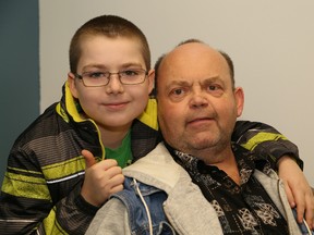 Bob Johnston, of the Blue Door Cafe, with Bob Jr. Bob Sr. recently received a donated organ.
John Lappa/Sudbury Star