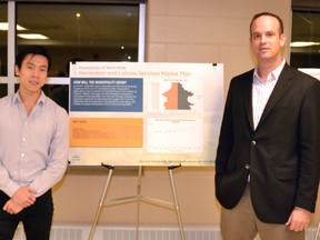 Planners Cyrus Yen (left) and Steve Langlois of Monteith Brown planning consultants, the company hired to complete the recreation and leisure master plan for the Municipality of West Perth, held an open house at the Mitchell and District Community Centre Nov. 25 to introduce residents to the current state of recreation and leisure in the community and to solicit their thoughts and ideas based on the information presented. GALEN SIMMONS/MITCHELL ADVOCATE