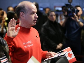Dror Bar-Natan becomes a Canadian citizen on Monday, Nov. 30, 2015 in Toronto. He later recanted the mandatory oath of allegiance to the Queen. (CRAIG ROBERTSON/Toronto Sun)