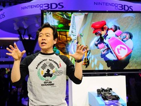 Japanese video game designer and producer Hideki Konno talks about his latest production "Mario Kart 8" during the Wii U Software Showcase at E3 in Los Angeles, California June 11, 2013. (REUTERS/Gus Ruelas)