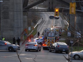 One individual was rushed to hospital and another remained at the scene in unknown condition after an apparent fall from the Michigan Central Railroad Trestle Monday afternoon. Police, fire and EMS responded to the scene at about 4 p.m. and re-routed traffic as they investigated. (Jennifer Bieman/Times-Journal)