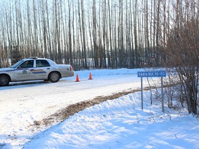 RCMP officers received a call for assistance from the rural home east of Edson on Sunday just before 2 p.m. Upon arrival, they found the victims, all suffering obvious signs of trauma. Chris Funston/Postmedia