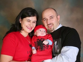 Avni Lushaku with his wife, Shqipe, and one-month-old son Artin. (Submitted photo)
