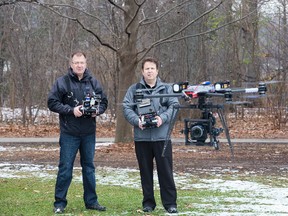 Photographer Andrew Gough, left, and unmanned aerial vehicle operator Glen Comerford have combined their talents to photograph real estate in London. (DEREK RUTTAN, The London Free Press)