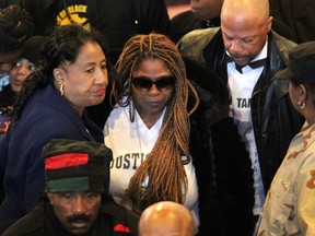 Samaria Rice (C) leaves the funeral services of her son Tamir Rice in Cleveland, Ohio in this file photo from December 3, 2014.  Rice, mother of the 12-year-old boy who was fatally shot in November 2014 outside a Cleveland recreation centre testified November 30, 2015 to a grand jury weighing whether to charge two officers in his death, her attorney said. REUTERS/Aaron Josefczyk/Files