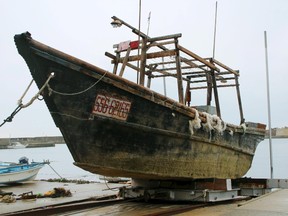Unidentified wooden boat which was found in the sea off Noto Peninsula, is seen in Wajima, Japan, in this photo taken by Kyodo November 29, 2015. Picture taken November 29, 2015. (REUTERS/Kyodo)