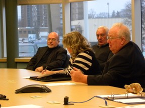 Ernst Kuglin/The Intelligencer
Quinte Immigration Services executive director Orlando Ferro, Deputy Mayor Jim Alyea, Quinte West Mayor Jim Harrison and executive assistant Jane Mielke attend a meeting Tuesday morning at city hall in Trenton. The city invited local organizations, the military and service clubs to the meeting in an effort to start co-ordinating donations and offers from residents to volunteer. The city will act as an information hub, via its website, to direct people to where they can best help.