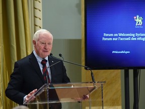 Governor General David Johnston speaks at the start of the Forum on Welcoming Syrian Refugees to Canada at Rideau Hall in Ottawa on Tuesday, Dec. 1, 2015. THE CANADIAN PRESS/Justin Tang