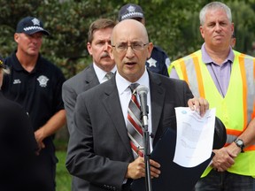 In a Sept. 9, 2015 photo, Chicago Police Department Chief of Detectives John Escalante speaks at a news conference at the Garfield Park Field house in Chicago. (Antonio Perez/Chicago Tribune via AP)