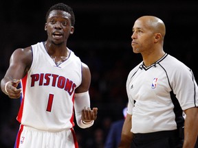 Detroit Pistons guard Reggie Jackson talks to referee Marc Davis after a call during the fourth quarter against the Houston Rockets at The Palace of Auburn Hills. Pistons win 116-105. (Raj Mehta/USA TODAY Sports)