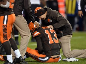 Cleveland Browns quarterback Josh McCown is attended to by the Cleveland Browns training staff after being injured during the fourth quarter against the Baltimore Ravens at FirstEnergy Stadium. (Ken Blaze-USA TODAY Sports)