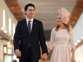 Canadian Prime Minister Justin Trudeau and his wife Sophie Gregoire arrive for the opening ceremony of the Commonwealth Heads of Government Meeting (CHOGM) in Valletta, Malta November 27, 2015. REUTERS/Stefan Rousseau/Pool