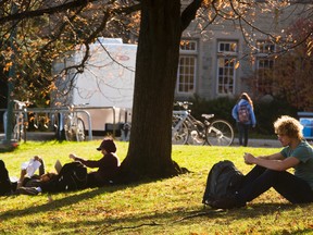 Students tried to catch some sun while studying on university hill at Western University in London, Ont. on Monday November 16, 2015. Mike Hensen/The London Free Press/Postmedia Network