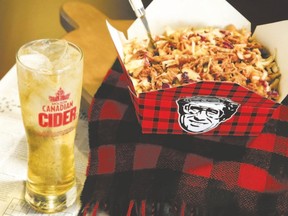 Harvest Cider Poutine marries Smoke?s Poutinerie with Molson Canadian Cider for a refreshing ? maybe even patriotic ? treat.
