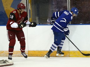 Mitch Marner (right) gets away from Dylan Strome (left) during the NHLPA rookie showcase at Maple Leaf Gardens in Toronto on Sept. 1, 2015. (Dave Abel/Toronto Sun)