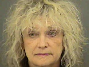 This booking photo provided by the Mecklenburg County Sheriff's Office shows Joanne Snow. Snow, an American Airlines flight attendant accused of attacking fellow crew members and two U.S. air marshals during a trans-Atlantic flight, made her first court appearance on Tuesday, Dec. 1, 2015, where attorneys argued over whether she should be held in custody or released to her family. (Mecklenburg County Sheriff's Office via AP)