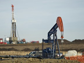 Pumpjack and drilling site near Bruderheim, Alberta on Jan. 11, 2012. (Ian Kucerak/Edmonton Sun)