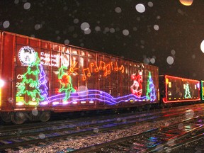 Thousands greeted the CP Holiday Train, despite the rain, as it rolled into Woodstock on Dec. 1, 2015. (MEGAN STACEY/Sentinel-Review)