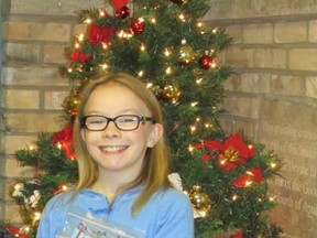 Paige Ferguson is pictured in this file photo taken in 2014 at the annual fundraiser she helps organize for the Inn of the Good Shepherd. A member of Grace United Church, Paige, now 11 years old, is planning to have the event again. It takes place on Dec. 21 at the church. Submitted photo