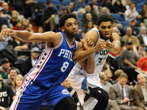 Philadelphia 76ers centre Jahlil Okafor (left) boxes out against Minnesota Timberwolves centre Karl-Anthony Towns at Target Center. (Marilyn Indahl/USA TODAY Sports)