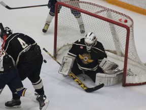 Flyers goalie, Nathan Watson, saves a goal during the second period in the game against the Wingham Ironmen on Nov. 28. (Laura Broadley/Goderich Signal Star)