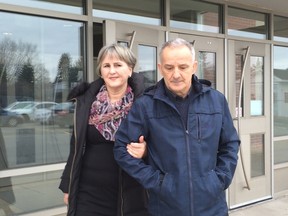Bruno Kraljevic, right, filed a complaint against three Ottawa Police officers that resulted in a disciplinary hearing that began Tuesday. Branka Kraljevic, left, was the hearing's first witness. She testified on Tuesday, Dec. 1, 2015 at a room at Algonquin College being used for the four-day hearing. (COREY LAROCQUE/OTTAWA SUN/POSTMEDIA NETWORK)