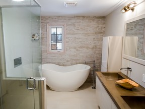 The rule of thumb for a bathroom renovation is that it typically costs between five and 15 per cent of a home's value. If a friend or colleague said they paid less for a similar project, it's likely they've left out part of the cost. (Designer: Cassandra Nordell-MacLean/CopyrightWilliam Standen Co. 2015)
