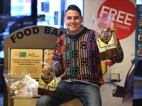 Dan Johnstone aka Dan the Can Man, 2015 Adopt a Teen Honorary Chair pose some hoots at Southgate in Edmonton, Alberta, on Wednesday, December 2, 2015. Perry Mah /Edmonton Sun/Postmedia Network