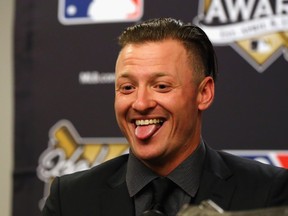 Toronto Blue Jays infielder Josh Donaldson sticks out his tongue during the Hank Aaron Award press conference before Game 4 of the World Series between the Kansas City Royals and the New York Mets at Citi Field. (Jeff Curry/USA TODAY Sports)