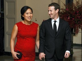 Mark Zuckerberg, Chairman and CEO of Facebook, and his wife Priscilla Chan arrive for an official State dinner at the White House in Washington, in this September 25, 2015 file photo. Zuckerberg and his wife said they plan to give away 99% of their fortune in Facebook stock to a new charity the couple were creating, while announcing the birth of their first child on December 1, 2015.  REUTERS/Mary F. Calvert/Files