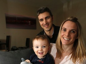 Mathieu Cousin, Erika Mistiaen and their 22-month-old son, Nathan, who are faced with deportation back to France because of a bureaucratic backlog, are pictured on Wednesday December 2, 2015. (Michael Peake/Toronto Sun)