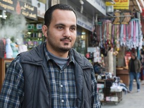 Syrian refugee Khaled Dos, 25, from Busra Alsham, Syria is seen on the streets of Amman, Jordan, Wednesday, December 2, 2015 in Amman. As a single man, Dos's hopes to immigrate to Canada are slim due to a decision by the Canadian government. THE CANADIAN PRESS/Paul Chiasson