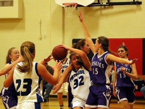 Huron Park Huskies Kaila Gregga right, attempts a block attempt in their TVRA southeast division junior girls' basketball final against the Parkside Collegiate Institute Stampeders in Dorchester, Ont. on Tuesday November 17, 2015. The annual Captains/Veterans All-Star girls' basketball game will take place Thursday at 7 p.m. at Woodstock Collegiate Institute. (Greg Colgan, Sentinel-Review)