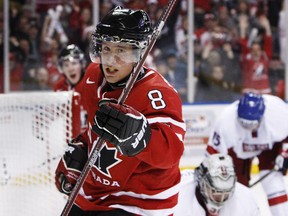 Canada's Jaden Schwartz (8) celebrates after scoring on the Czech Republic's goaltender Filip Novotny during the first period of their game at the 2011 IIHF World Junior Championships in Buffalo, New York, December 28, 2010. The 2011 junior team finished with the silver medal.  REUTERS/Mark Blinch