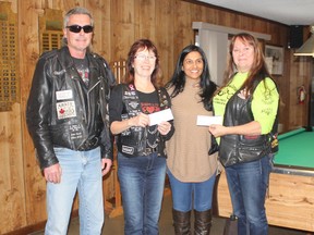 The Association of Bikers for Awareness, Training and Education and the Lake Huron Steel Horse Riders presented Anita Shah of Childcan with $2,200 on Nov. 21. Presenting the cheque were, from left to right, Cuzman, Kimmer, Anita Shah and Brenda Brown. (Laura Broadley/Goderich Signal Star)