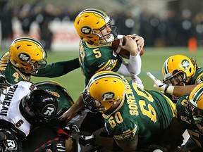 Edmonton Eskimos QB Jordan Lynch scores the winning touchdown on a third-down run to beat the Ottawa RedBlacks in the 2015 CFL championship at Investors Group Field in Winnipeg on Nov. 29, 2015. Kevin King/Winnipeg Sun/Postmedia Network