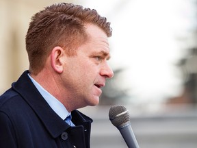 Wildrose Party leader Brian Jean speaks during an anti-Bill 6 rally put on by the Wildrose Party in front of the Alberta Legislature in Edmonton, Alta., on Thursday, December 3, 2015. Bill 6, the Enhanced Protection for Farm and Ranch Workers Act, has proven controversial with farmers and ranchers in the province. Ian Kucerak/Edmonton Sun/Postmedia Network