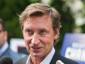 Wayne Gretzky feels tinkering with the goal posts would help increase offence in the NHL. (Ernest Doroszuk/Toronto Sun/Files)