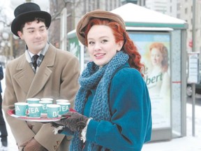 Actors Ellen Denny of London and Alex Furber, playing Anne Shirley and Gilbert Bylthe, used Ottawa?s first snowfall as a fun way to promote their of production of Anne & Gilbert: The Musical, playing at the National Arts Centre through Dec. 20. (Julie Oliver, Postmedia Network)