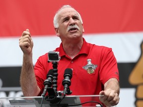 CHICAGO, IL - JUNE 18: Head coach Joel Quenneville of the Chicago Blackhawks speaks to the crowd during the Chicago Blackhawks Stanley Cup Championship Rally at Soldier Field on June 18, 2015 in Chicago, Illinois.   Jonathan Daniel/Getty Images   Jonathan Daniel/Getty Images/AFP== FOR NEWSPAPERS, INTERNET, TELCOS & TELEVISION USE ONLY ==