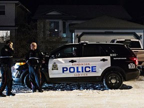 Police are at the scene of a disturbance that occurred at a home near 171 Avenue and 83 Street in Edmonton, Alta., on Thursday, Dec. 3, 2015. Codie McLachlan/Edmonton Sun/Postmedia Network