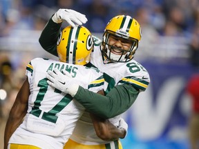 Packers wide receiver Davante Adams (17) is congratulated on his touchdown by teammate tight end Richard Rodgers (82) against the Lions during second half NFL action in Detroit on Thursday, Dec. 3, 2015. (Duane Burleson/AP Photo)