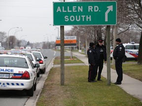 Toronto Police search the area at Wilson Heights Blvd. and Sunbeam Ave. related to car being found with guns in the trunk at Transit Rd. near Allen Rd. on Dec. 4, 2015. (Craig Robertson/Toronto Sun)