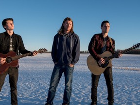 The Adams brothers in the fading sunlight at their parents' home in Alberta Beach on Sunday, Nov. 29. Adams is the songwriter for the band West of Here, a Christian rock band made up of Matt and his brothers. - Yasmin Mayne, Reporter/Examiner