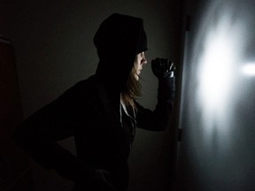 A photo illustration of a burglar. - Yasmin Mayne, Photo Illustration