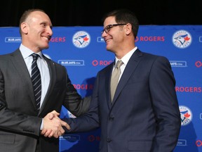 Blue Jays president Mark Shapiro (left) introduces Ross Atkins, the new general manager, on Friday December 4, 2015. (Veronica Henri/Toronto Sun/Postmedia Network)